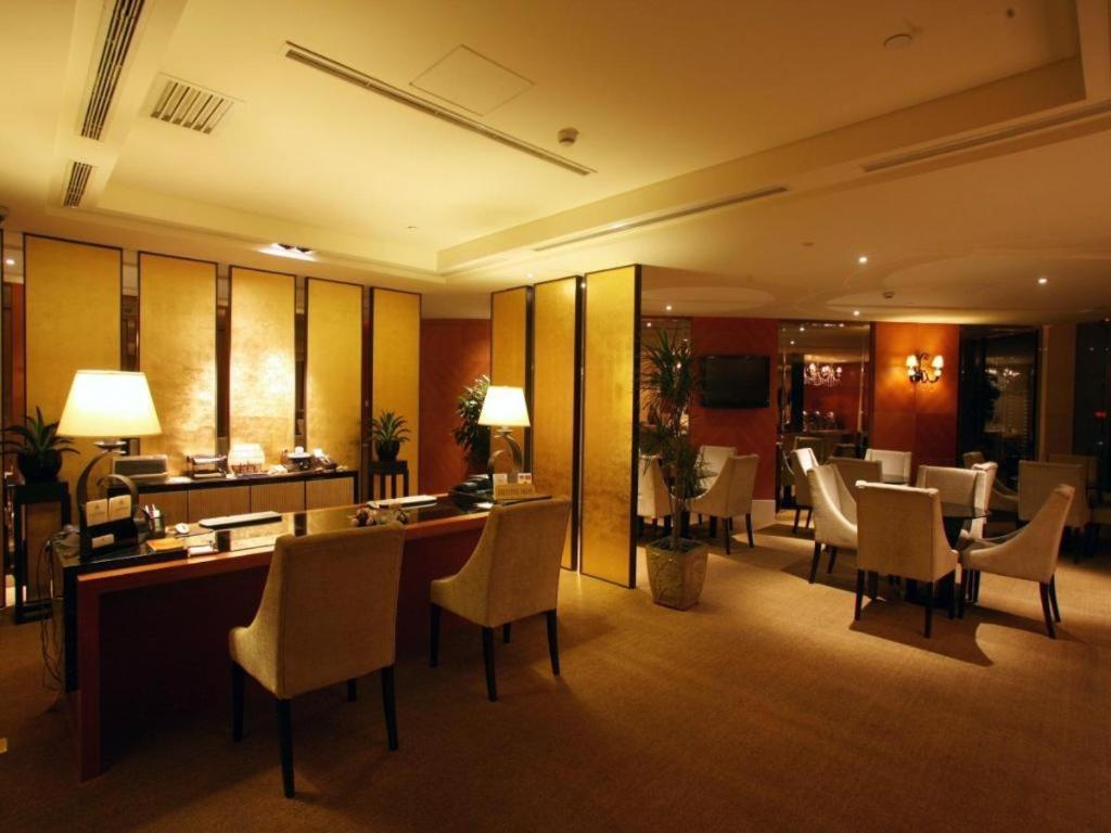 Huana Hotel Minhang Shanghai Esterno foto